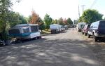 Multiple vehicles are parked on Southeast Clackamas Road, the largest homeless encampment in Clackamas County, on Sept. 20, 2024. The local sheriff's office is clearing the camp on Sept. 30.