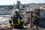 Workers have completed the installation of the chimney on top of the Vatican building in Rome, Italy. The color of the chimney smoke will give some hints to the public about how the papal selection process is going.