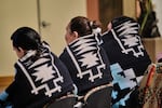 Graduating Indigenous students were gifted and wrapped in blankets during the 2023 Honor Day ceremony at the Native American Student & Community Center.