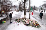 People gather at a makeshift memorial for Renee Nicole Good, 37, who was shot and killed on Wednesday by an ICE officer as she apparently tried to drive away from a group of ICE officers in Minneapolis.