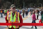 Malcolm Freund guards the red ribbon stretched across the new Sellwood Bridge. The span was dedicated on Feb. 27 and will open the first week of March.