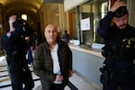 Yunice Abbas, one of the men accused in the 2016 armed robbery of Kim Kardashian, arrives at the Palace of Justice in Paris on Monday.