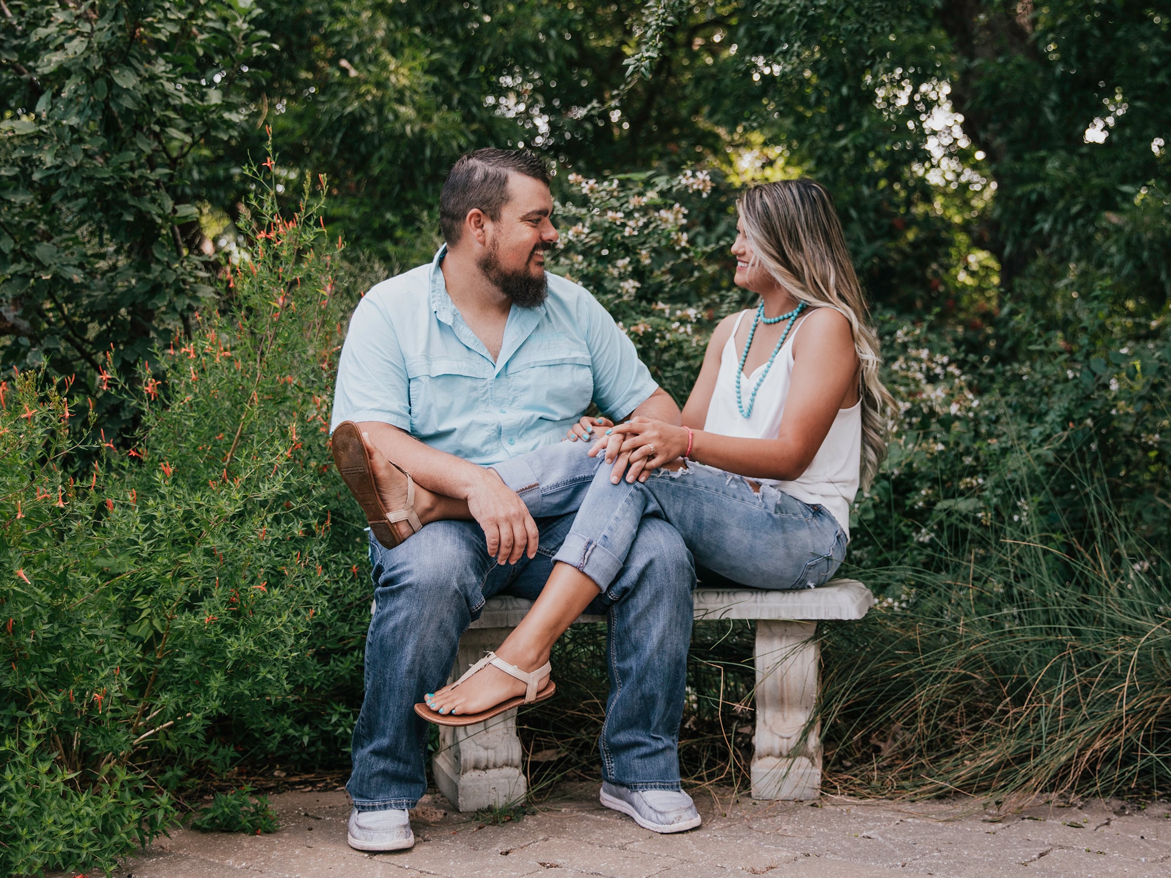 Jaci Statton and her husband, Dustin, in an engagement photo from 2021. Jaci had a partial molar pregnancy and was not treated by emergency rooms in Oklahoma. She traveled to Kansas for an abortion.