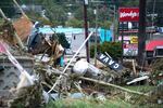 Storm damage from Hurricane Helene in Asheville, North Carolina, in September. Because of climate change, storms are more likely to become more intense, with higher wind speeds, heavier rainfall and more storm surge.