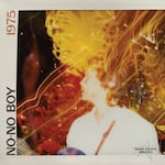 The album cover for No-No Boy has the name of the band, the name of the album, "1975," and a Polaroid-photo-style image of an Asian-American man with the words "Asian Pacific America" imprinted in the lower corner.