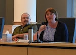 Eugene City Councilors Mike Clark, left, and Eliza Kashinski on July 14, 2025, in Eugene, Ore. Clark voted to remove a proposed fire services fee from the November ballot. Kashinski voted against.