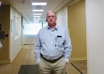 Dr. Jim McGovern in an administrative hallway at RiverBend Medical Center in Springfield, one month after being named chief hospital executive in 2024.