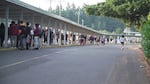 Students walk along the breezeway at David Douglas High School in Southeast Portland. About half of the students in OPB's Class Of 2025 project attend David Douglas, the largest high school in the state.