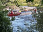 Crews from Eugene Springfield Fire's Gateway Station rescued a person from a log in the middle of the McKenzie River after a tubing incident on May 29, 2021.