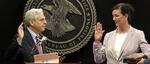 Attorney General Merrick Garland (left) swears in Colette Peters as the twelfth director of the federal Bureau of Prisons on Aug. 2, 2022.