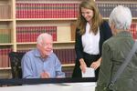 Former President Jimmy Carter signs books at Powell's Books in Portland.