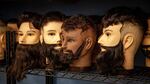 Practice mannequin heads at the Champions Barbering Institute on Friday, May 1, 2020, in Portland, Ore.