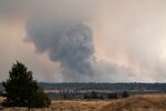 The Bench Fire is seen from Highway 26 near Warm Springs, Ore., on July 30, 2026.