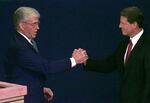 Republican vice presidential candidate Jack Kemp (left) shakes hands with Vice President Al Gore moments before the 1996 vice presidential debate in St Petersburg, Fla. It was the last time -- until this year -- that both major parties had picked a veteran for vice president.