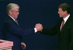 Republican vice presidential candidate Jack Kemp (left) shakes hands with Vice President Al Gore moments before the 1996 vice presidential debate in St Petersburg, Fla. It was the last time -- until this year -- that both major parties had picked a veteran for vice president. 