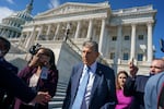 Sen. Joe Manchin, D-W.Va., a centrist Democrat vital to the fate of President Joe Biden's $3.5 trillion domestic agenda, is surrounded by reporters outside the Capitol in Washington, Wednesday, Sept. 29, 2021. Manchin and other senators were boarding a bus to attend a memorial service for the late Susan Bayh, the wife of former Senator Evan Bayh of Indiana, who died earlier in the year.