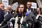 Stella Assange, the wife of Julian Assange, gives a statement outside the Royal Courts of Justice in London, after he won a bid at the High Court to bring an appeal against his extradition to the United States.