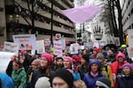 Demonstrators march through the rain at Women's March on Portland on Saturday, Jan. 21, 2017.