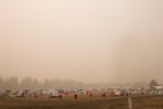 Smoke settles on a fire camp at the Sisters Rodeo Saturday, Sept. 12, 2020, in Sisters, Ore. 