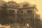 The Pittock Mansion under construction: The mansion was designed by the famous Oregon-native architect Edward Foulkes. He also designed the Oakland Tribune Tower, from which Harry Houdini famously escaped in 1923, dangling upside down in a straight jacket.