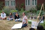 Jenna Mobley leads a lesson on worms at FoodCorps training in Portland.