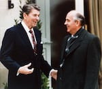 President Ronald Reagan, left, and Soviet leader Mikhail Gorbachev talk during a meeting outside the vila Fleur D'Eau at Versoix, near Geneva, Switzerland, Tuesday, Nov. 19, 1985.