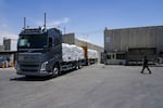 A truck with bundle of humanitarian aid for the Gaza Strip drive at the Kerem Shalom border crossing in southern Israel, Thursday, May 30, 2024.