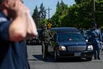 Members of law enforcement, fire and rescue and the community gather at the University of Portland's Chiles Center for Cowlitz County Sheriff's Deputy Justin DeRosier's memorial service on April 24, 2019.