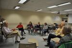 Pat Henry teaches a Quest class about religious activism in the 1960s.