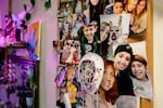 Photos of Becca Morris and her son, Jayden Dolly, along with other family members, are tacked to a bulletin board in her bedroom in Bridgeville, Delaware on Wednesday, May 14, 2025. (Wesley Lapointe/ for NPR)