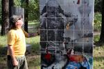 LH Project founder Jakob Haßlacher peers up at a Berlin Wall replica he made. It's a project he's returned to several times since 1989, when he was in Berlin during the wall's fall. 