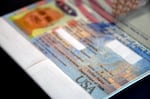 A passport belonging to Dana Zzyym — who sued the State Department to get a passport that didn't say male or female — rests on a table in Fort Collins, Colo., on Oct. 27, 2021.