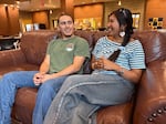FILE - In the basement of Whitman College’s Reid Campus Center, Aiden Wolf, a graduating theater major, talks with Lindsey Pasena-Littlesky, who double-majored in environmental studies and politics. Wolf and Pasena-Littlesky, Whitman’s first Šináata Scholars, will graduate this month.