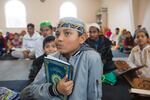 A Rohingya boy listens to Quranic lessons at Omar Farooq mosque on Dec. 2, 2018.