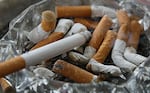 Image of cigarettes in an ashtray.