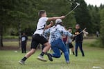 A girl runs for the goal during a game of doubleball at Wellness Warrior Camp.