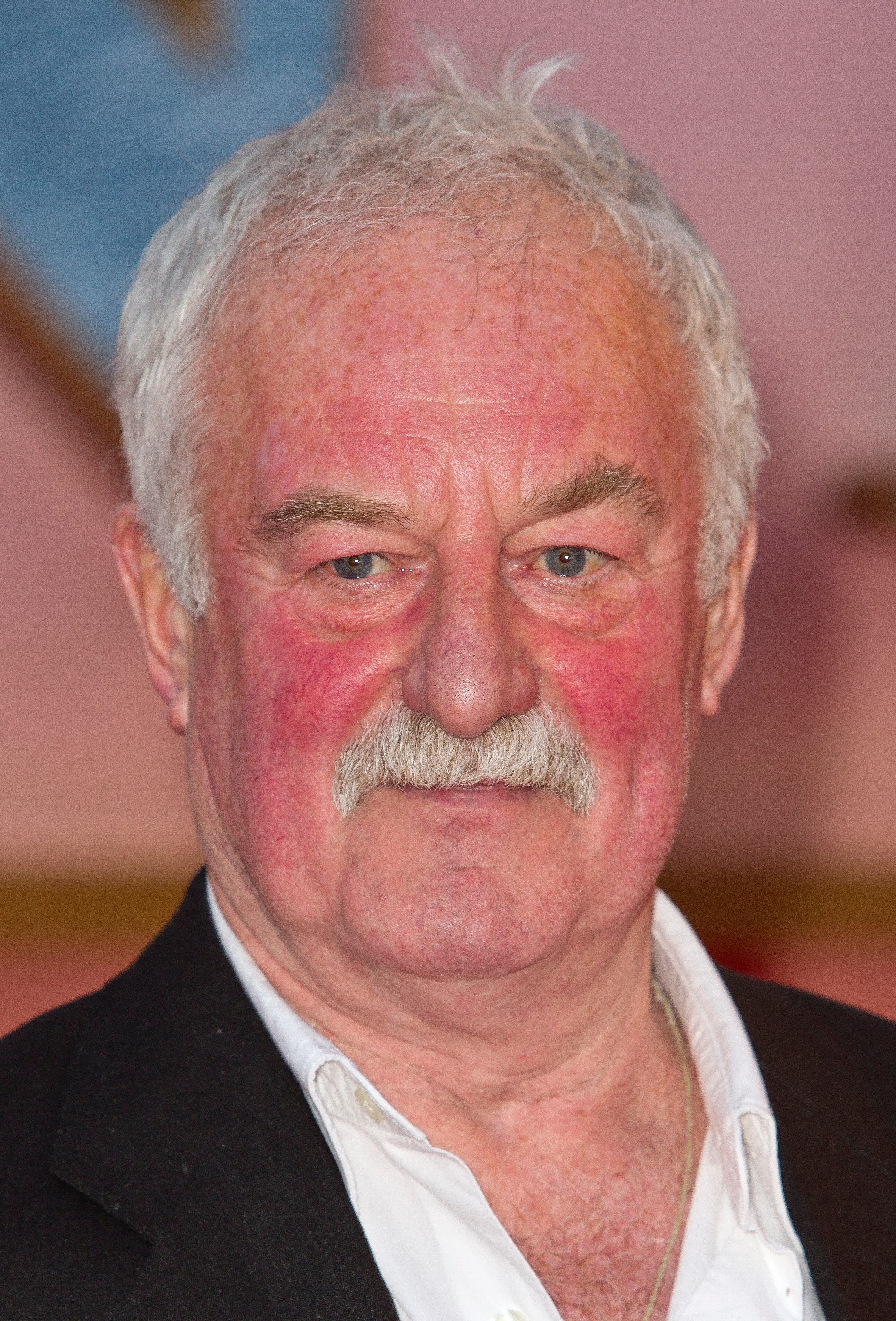 FILE - Actor Bernard Hill arrives at the 'Titanic 3D' UK film premiere at the Royal Albert Hall in Kensington, West London, Tuesday, March 27, 2012.