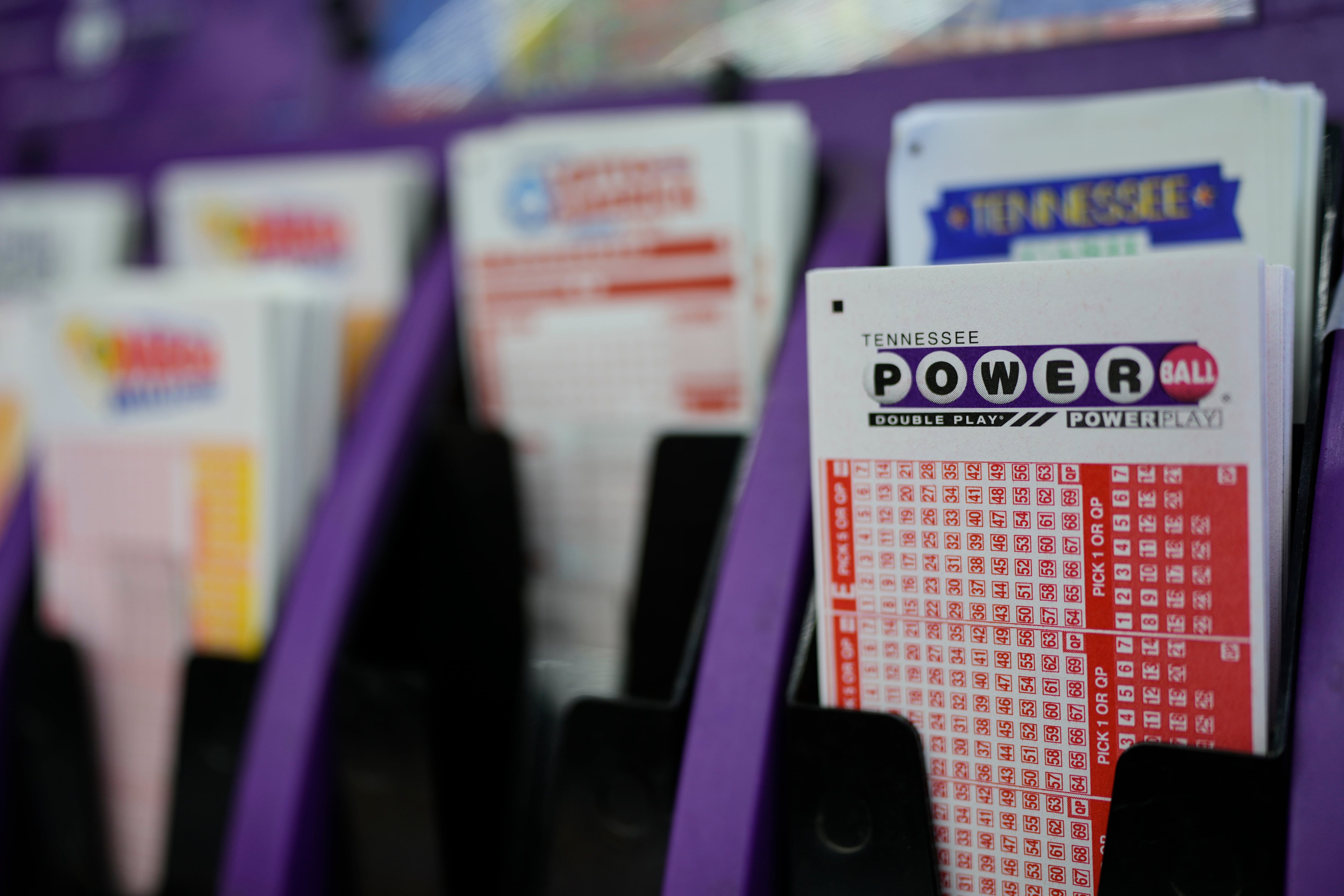 A Powerball play slip is seen at a store Wednesday, Dec. 17, 2025, in Nashville, Tenn.
