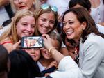 Vice President Harris takes a photo with guests during a 4th of July event on the South Lawn of the White House on July 4.