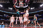 Damian Lillard #O of the Portland Trail Blazers goes up for a layup against the Chicago Bulls during the first half at United Center on Feb. 4, 2023, in Chicago.