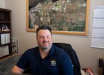 Umatilla City Manager David Stockdale in his office in April 2026. Stockdale says the arrival of the industry has provided much-needed cash flow to the town, and also acknowledges the environmental costs of data centers.