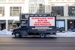 A mobile billboard that reads "ICE agents aren't above Maine Law. Illegal conduct can be prosecuted" is seen on January 30, 2026 in Portland, Maine.