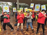 Protesters danced to their own version of "YMCA" in which they asked PGE why the utility is considering natural gas when wind and solar energy would be better for the planet.