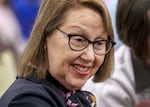 FILE - Oregon Attorney General Ellen Rosenblum prepares to speak at a hearing for House Bill 2002 at the Oregon State Capitol in Salem, March 20, 2023.