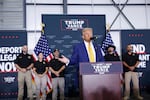 Former President Donald Trump gives remarks on border security inside an airplane hanger at the Austin-Bergstrom International Airport in Austin, Texas, on Friday.