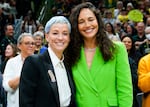 Megan Rapinoe, left, and Sue Bird pose for photographs before a WNBA basketball game between the Storm and the Washington Mystics, Sunday, June 11, 2023, in Seattle. 