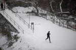A person seen running through the snow in Washington, D.C.