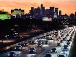 Cars head east out of Los Angeles during evening rush hour on January 25, 2024. They may have to drive slower if Calif. Gov. Gavin Newsom signs a bill requiring new passenger vehicles and large trucks sold in California to have technology to prevent drivers from going more than 10 miles an hour above the speed limit.