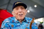 Ken Stevens, 102, of Powers, Ore., who survived the attack on Pearl Harbor talks to the media before the 83rd Pearl Harbor Remembrance Day ceremony, Saturday, Dec. 7, 2024, in Honolulu.