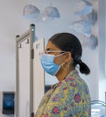 McDaniel High School teacher Darshanpreet Gill observes her students during class June 9, 2022. Gill teaches two sections of science for students new to the United States whose education has been impacted.